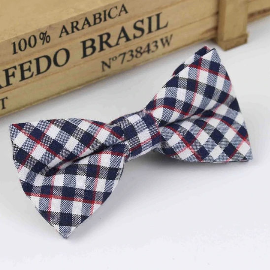 A navy blue bow tie with a check pattern on it